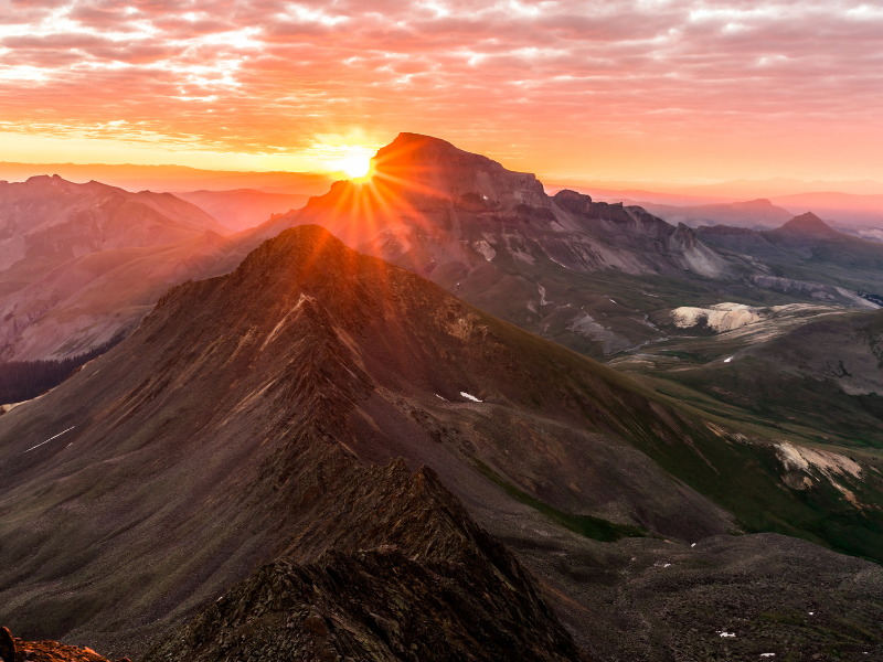 Photo of sunrise over mountain